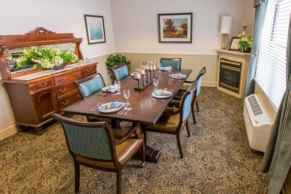 Elegant dining room setup with table and chairs