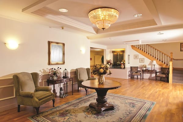 Lounge area with seating and decorative lighting