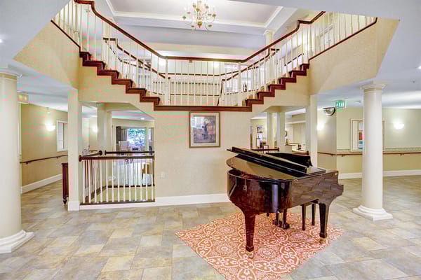 Interior view of a common area with a piano