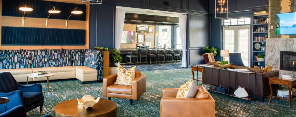 Lounge area featuring comfortable seating and a fireplace