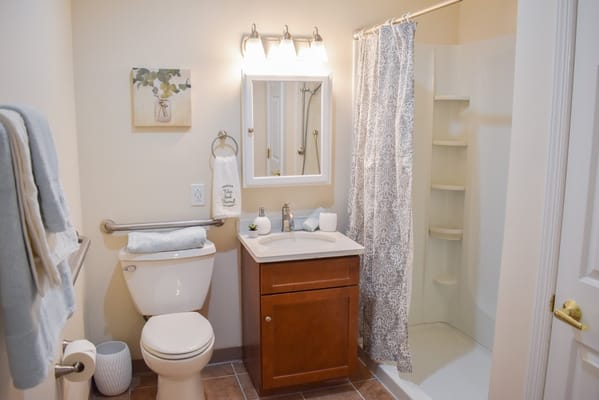 Well-lit bathroom with modern fixtures and decor