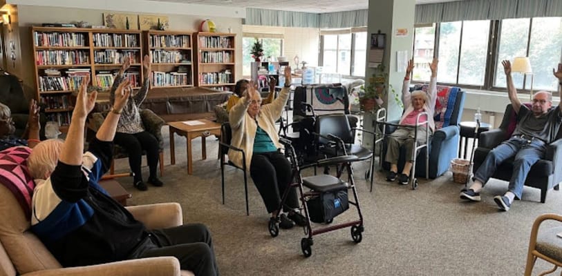 Residents participating in an activity in the common area.