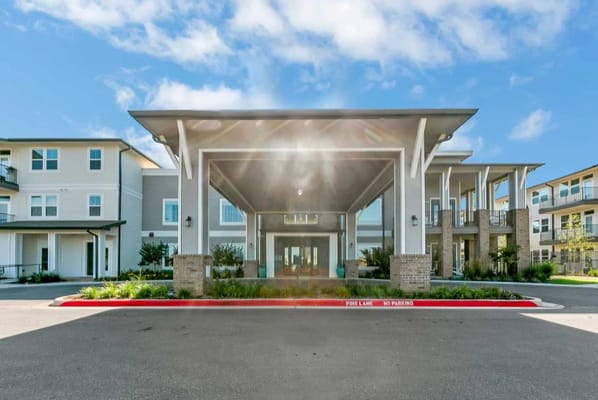 Front view of Sage Cobblestone senior living facility entrance