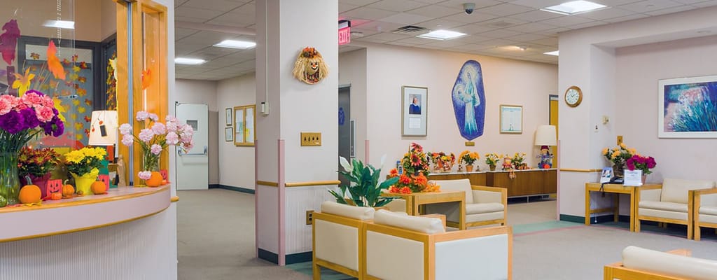 Common area with seating and floral decorations