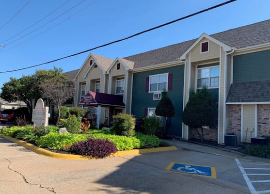 Exterior of Savannah House Senior Housing with landscaping