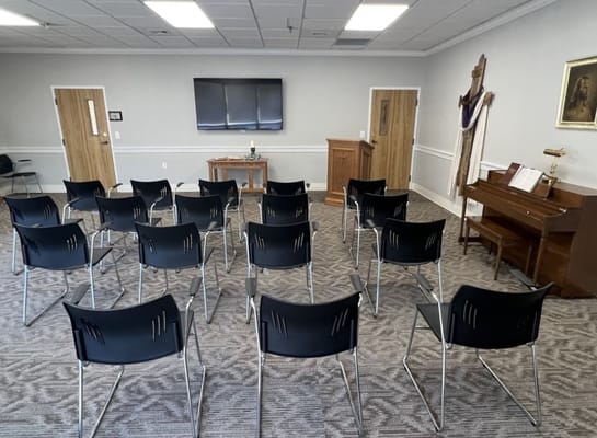 Common area with chairs set for a meeting