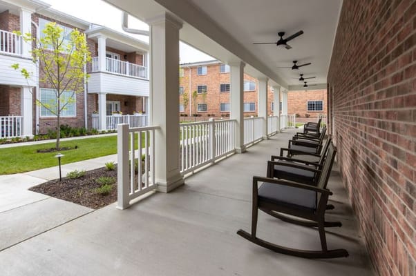 Outdoor seating area with rocking chairs