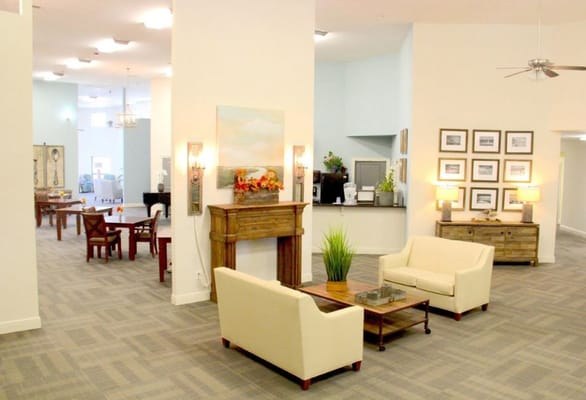 Comfortable seating area in the lobby with plants and decor