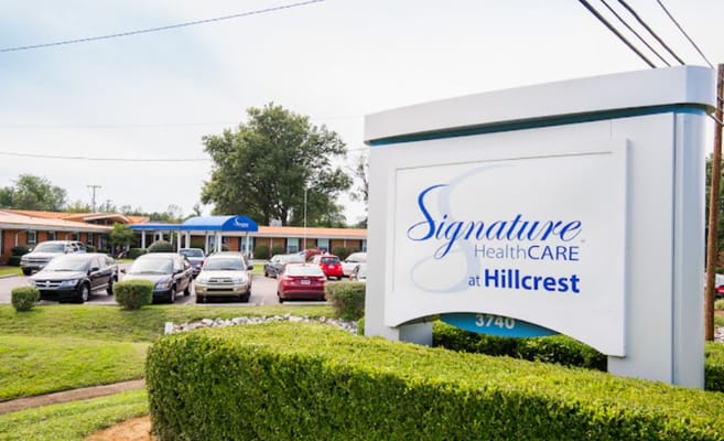 Sign for Signature Healthcare at Hillcrest at the facility entrance.