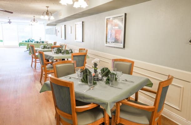 Clean and inviting dining area with tables set for meals