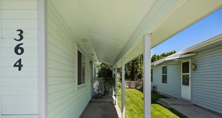 Covered walkway leading to resident rooms
