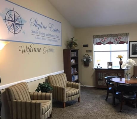 Comfortable seating and decor in the welcome area of Skyline Estates Senior Living.