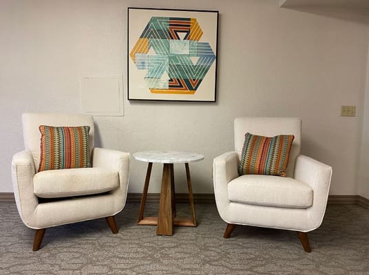 Comfortable seating area with colorful cushions