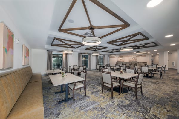 Spacious dining area with tables and chairs at Sooner Station