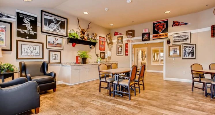 Cozy living room with seating and sports memorabilia