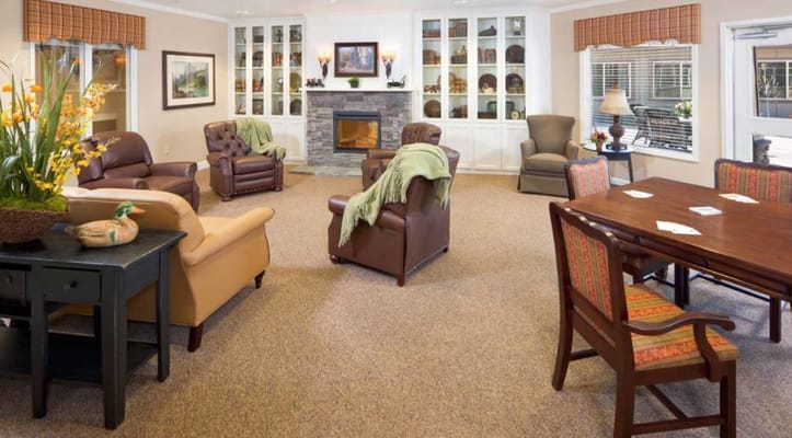 Spacious living room with comfortable seating and a fireplace