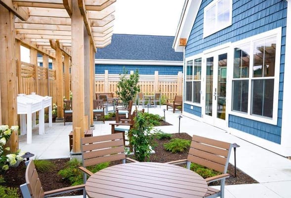 Outdoor seating area with shaded pergola