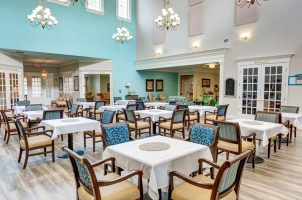 Bright dining area with tables and chairs at St. Augustine Plantation