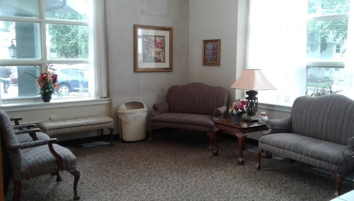 Cozy common area with seating and natural light