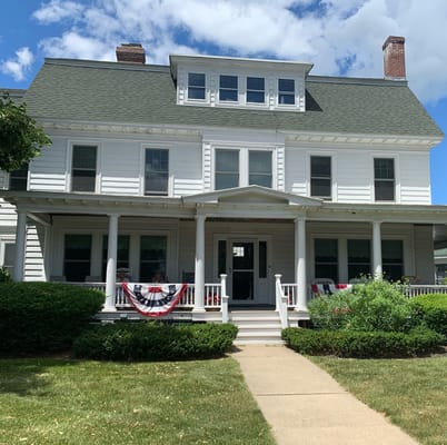Exterior view of Studley Home with porch area