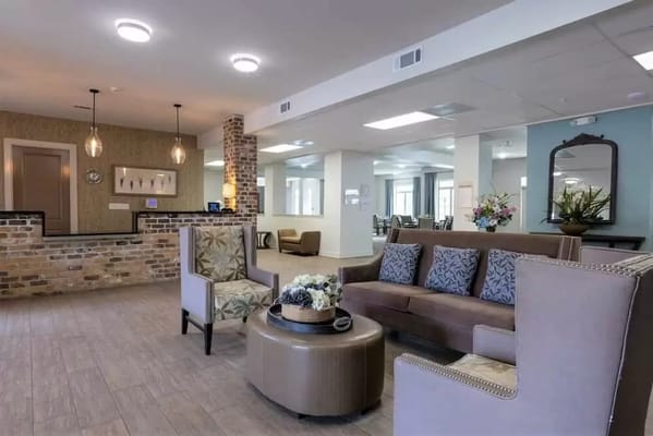 Bright and inviting common area with seating and decor