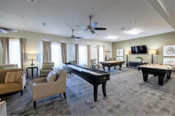 Interior common area with seating and pool tables