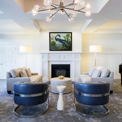 Cozy lounge area with gray sofas and modern seating