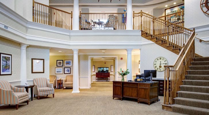 Bright and welcoming lobby with seating and a reception desk