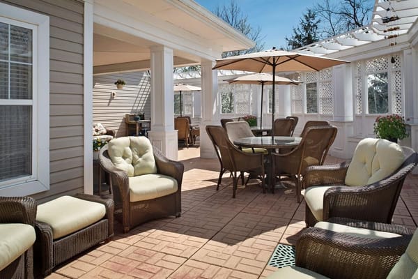 Outdoor seating area with patio and umbrellas