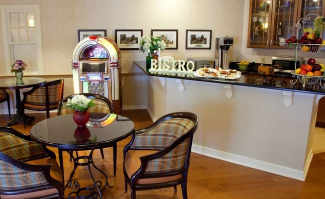Interior view of a cozy dining area with bistro decor