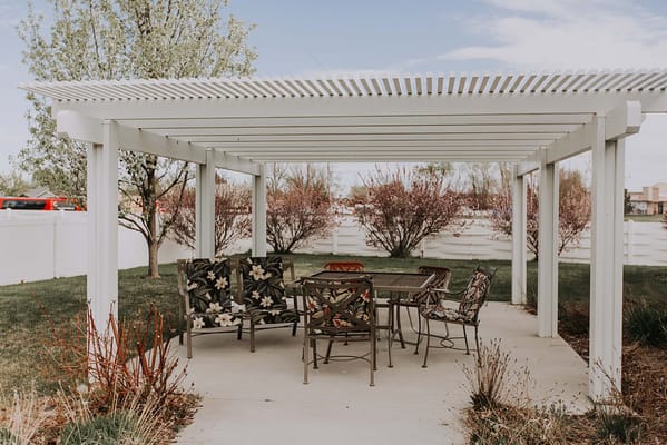 Outdoor seating area with shaded pergola
