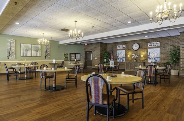 Bright dining room with tables and chairs