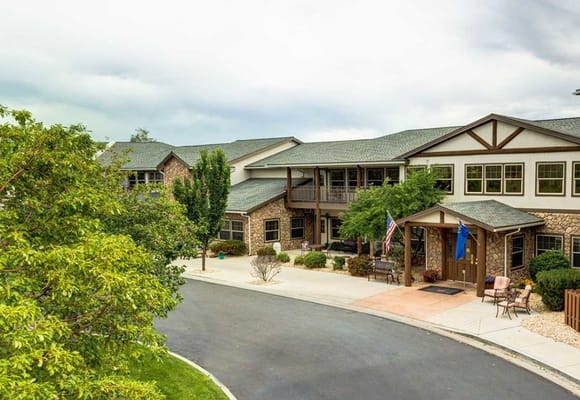 Aerial view of the Chateau at Gardnerville entrance with seating and flags.