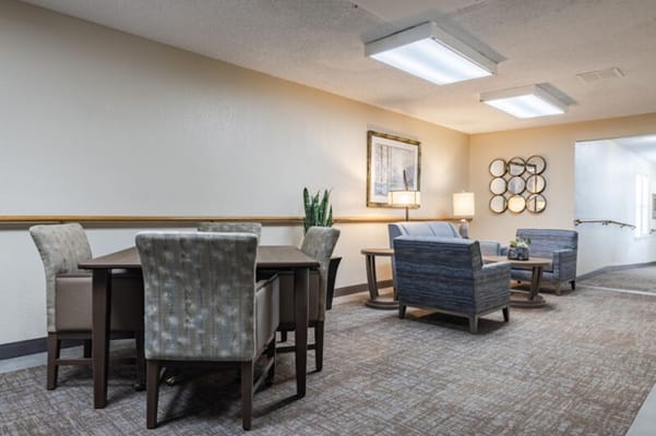 Cozy common area with seating and a dining table