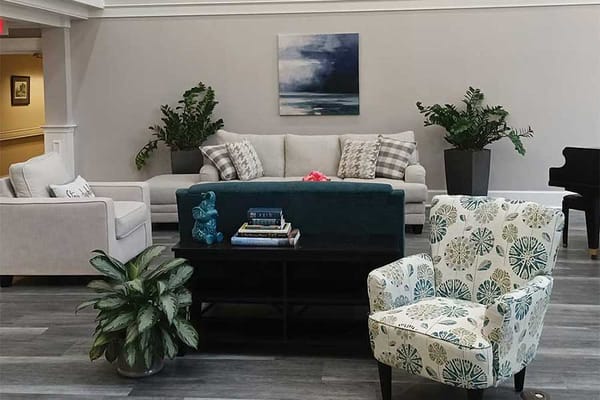 Bright and inviting common area with seating and plants
