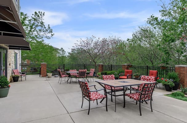 Patio with outdoor seating and greenery