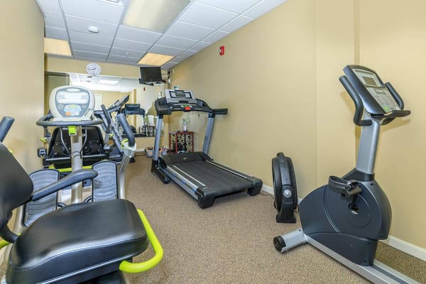 Exercise equipment in a fitness room for residents
