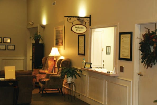 Interior view of the Welcome Center with seating and information desk.