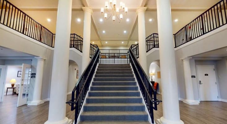 Interior view of a grand staircase in the facility