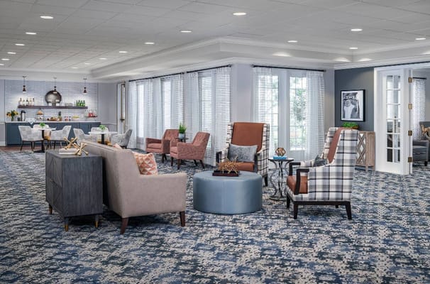 Spacious common area with seating and natural light