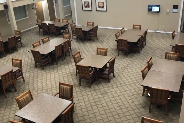 Spacious dining area with tables and chairs