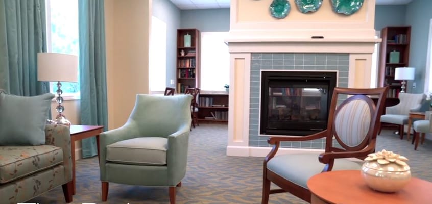 Comfortable seating and a fireplace in the lounge area