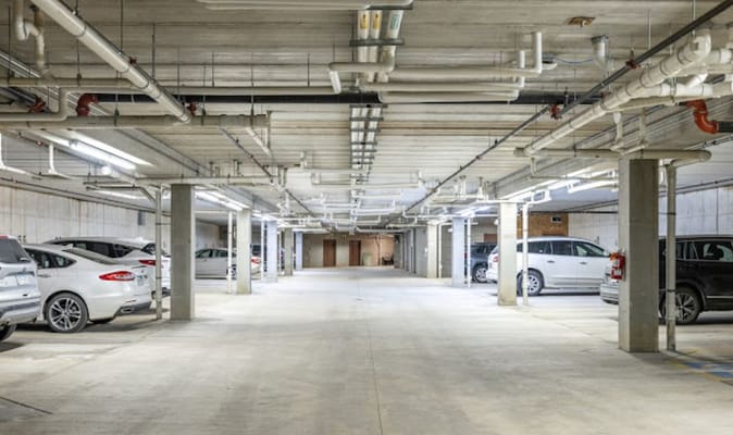 Interior view of the parking garage with parked cars