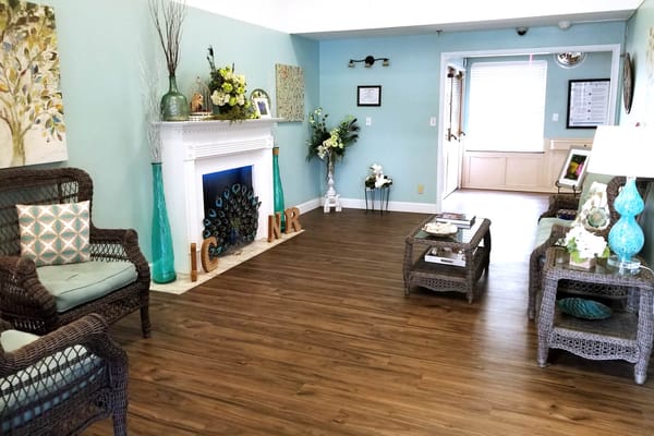 Cozy lobby with seating and decorative plants