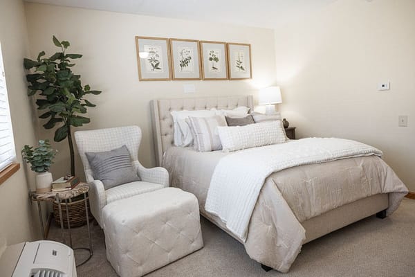Cozy bedroom in a senior living facility with decorative touches
