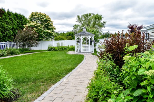 Gardens and gazebo in an outdoor space of the facility