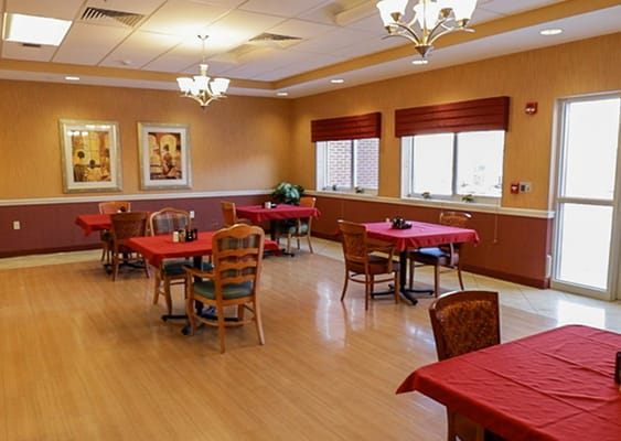 Dining room area with tables and chairs