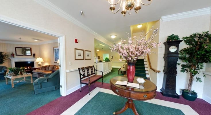 Bright inviting lobby area with decorative flowers