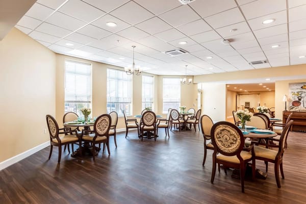 Elegant dining area with wooden tables and chairs