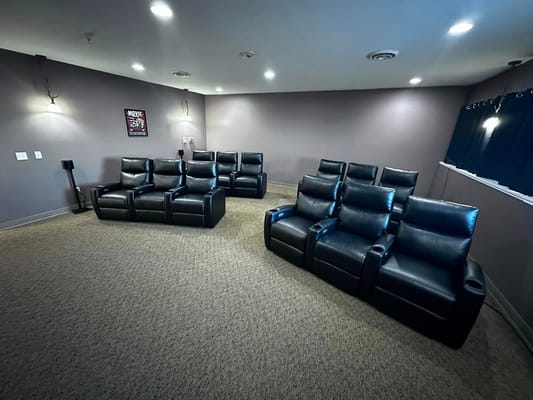 Seating area in a dimly lit theater room